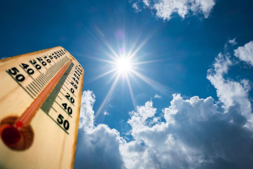 thermostat shows record high temperatures in direct sunlight, demonstrating need for smart solar attic fan